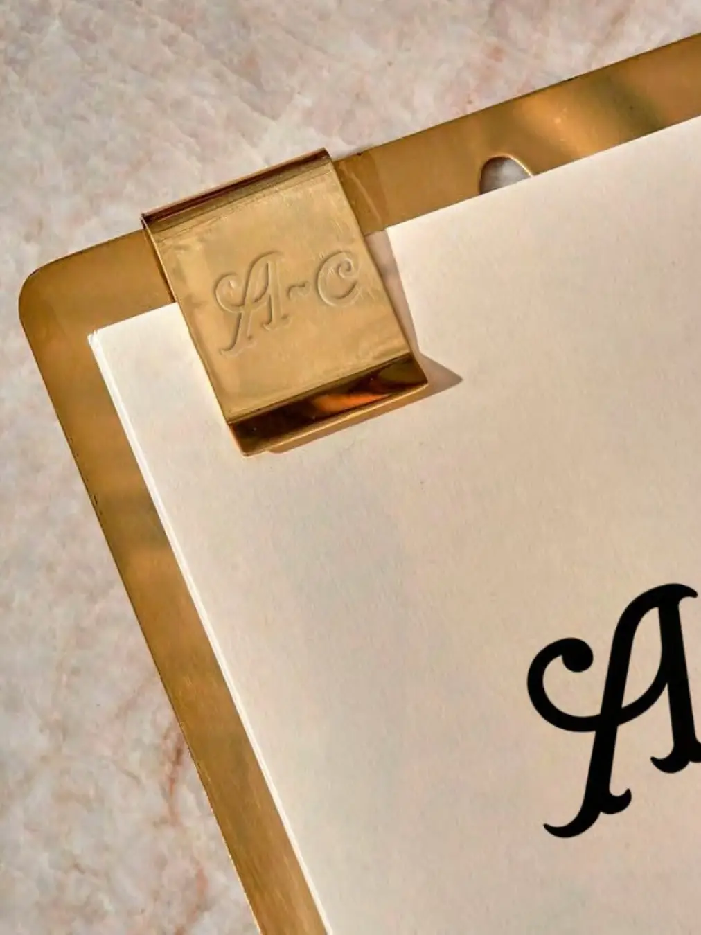 Menu with brass clip at A Costa Restaurant