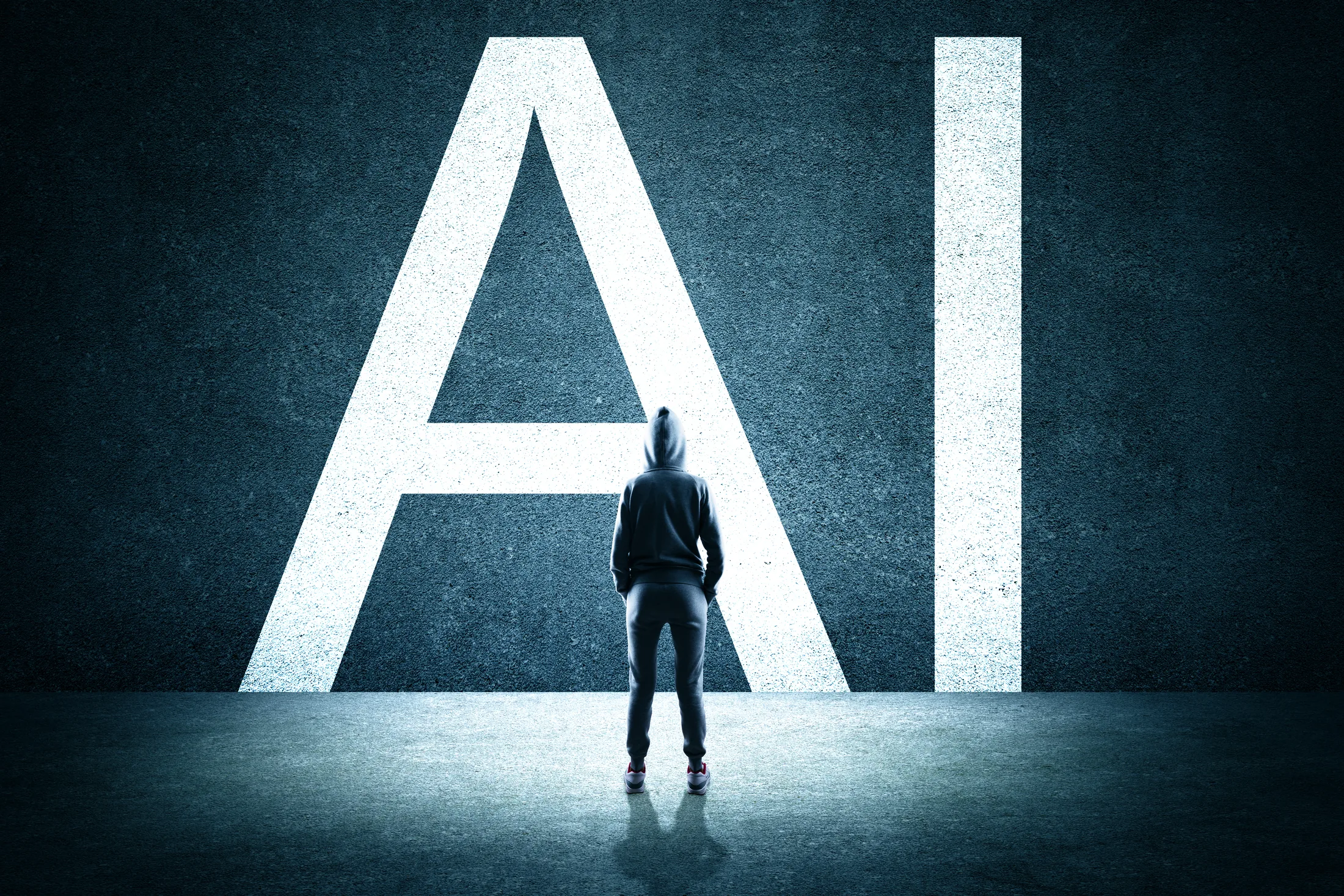PSC-News-Next-Traveller-05 · Permanent State of Creation A figure standing before giant illuminated letters spelling AI