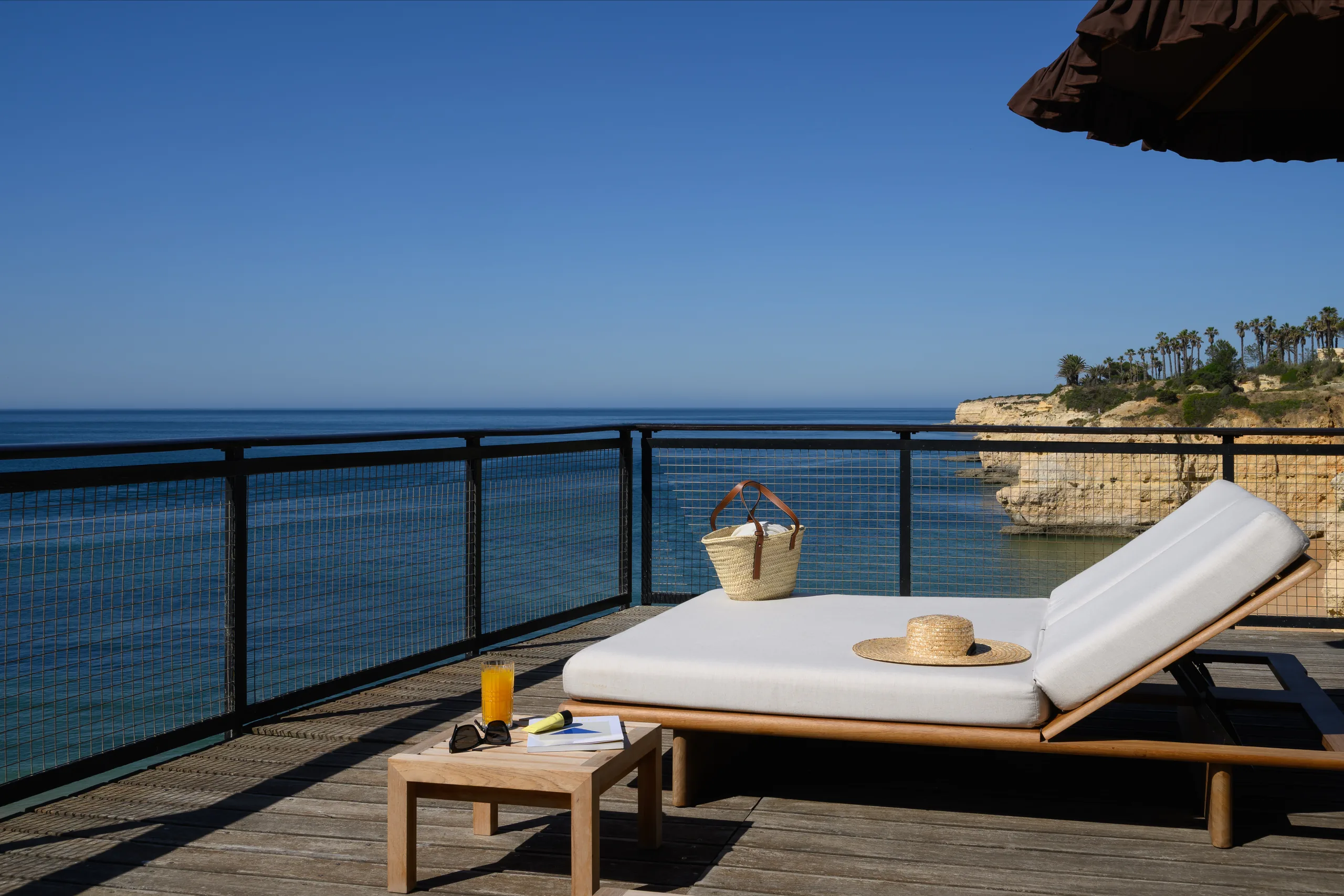 Sunbed on deck facing the sea at A Costa Restaurant