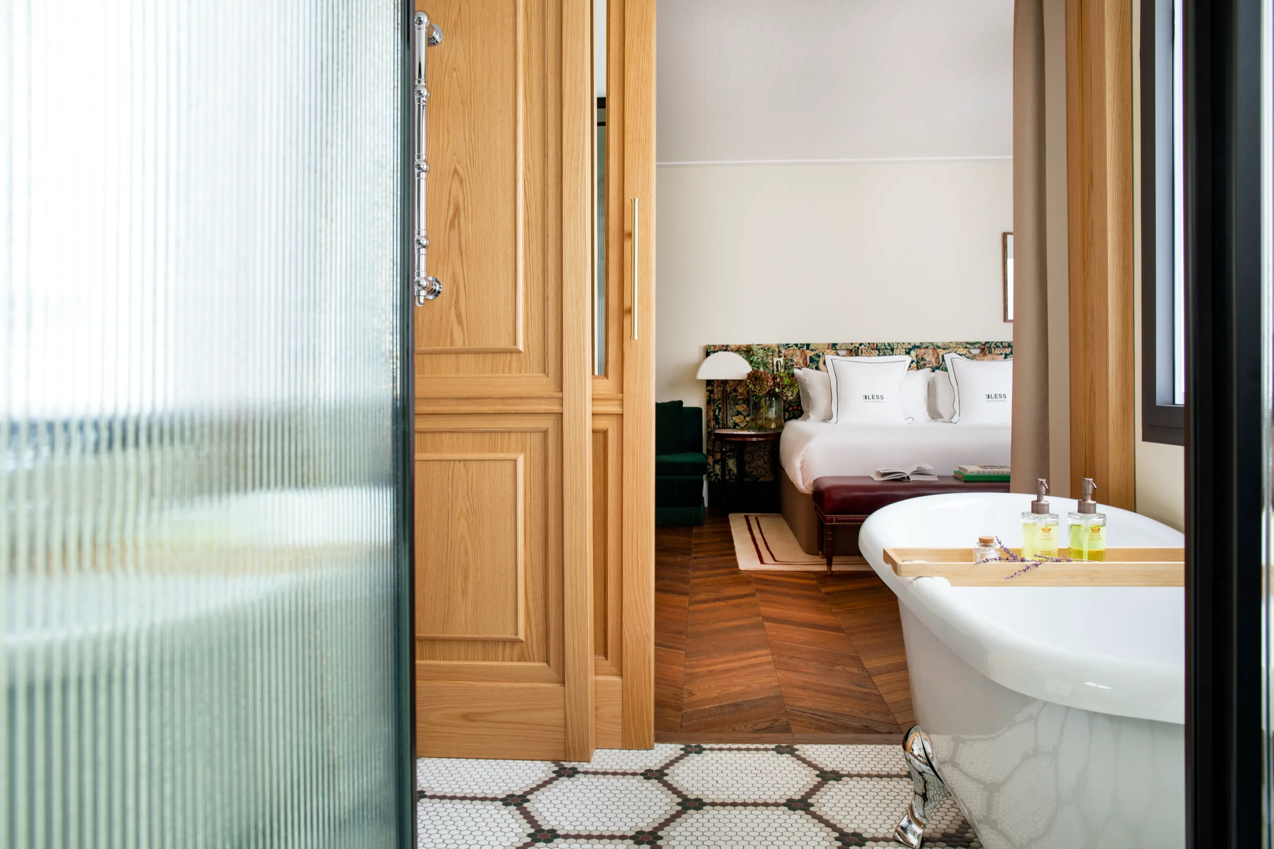 Glass door opening to bedroom and bath, BLESS Madrid